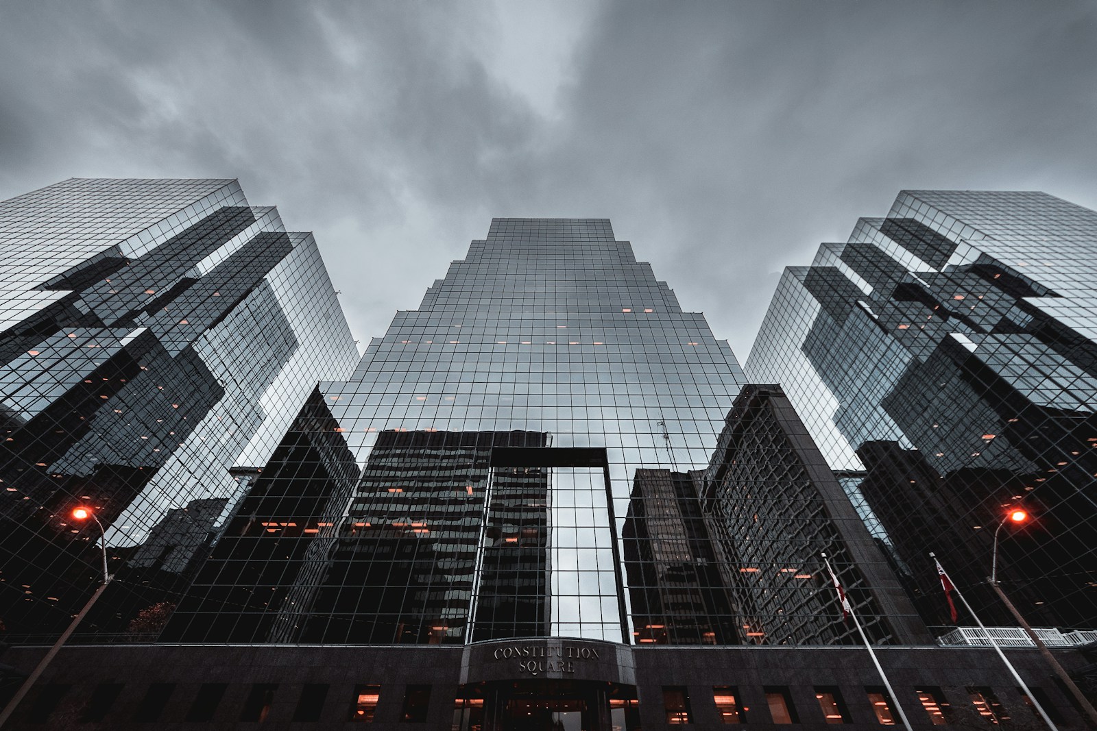 Temporary stock: symmetrical glass office towers photographed from below