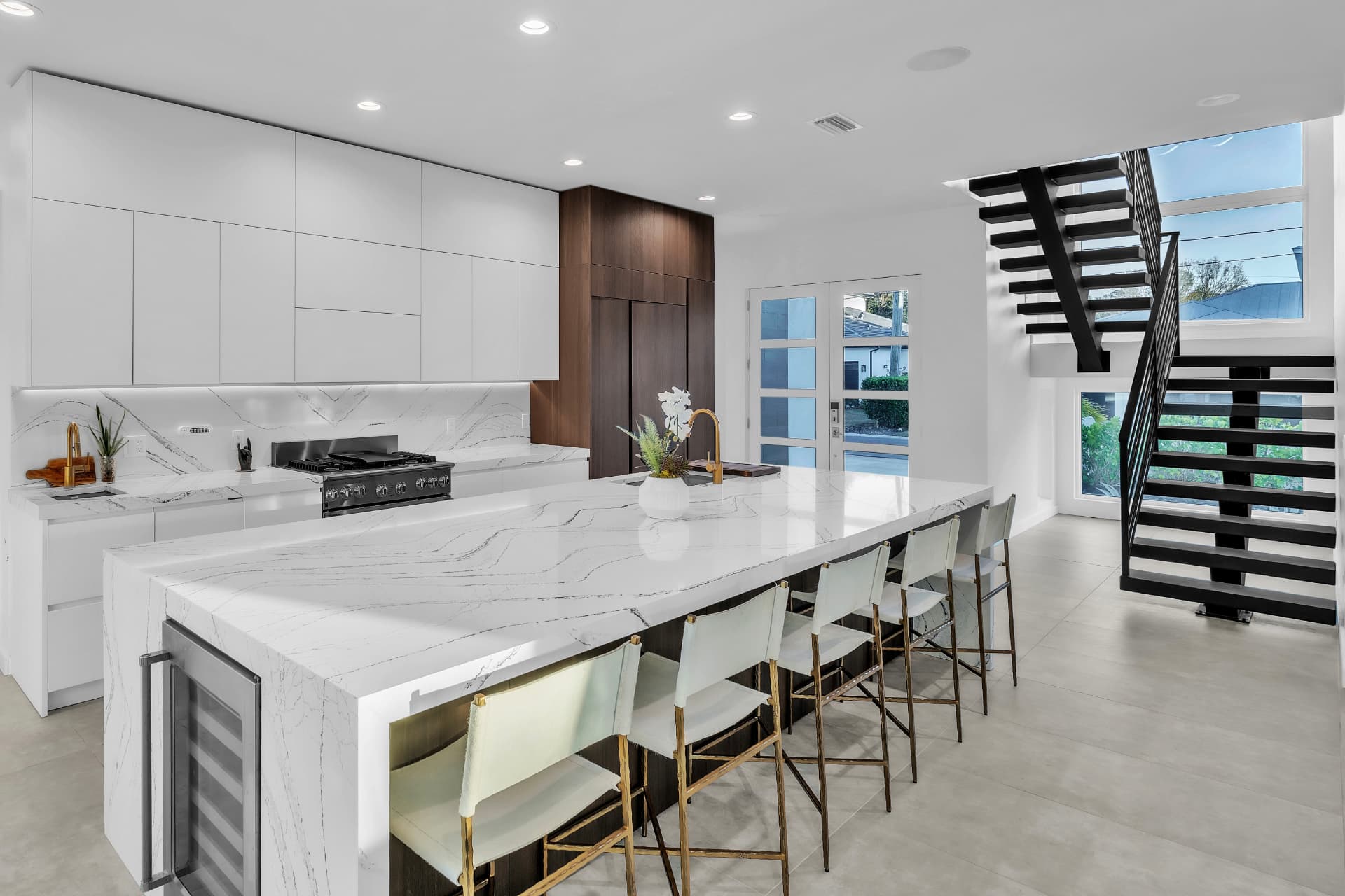 Open-plan kitchen and staircase photographed by Any Home Shoots