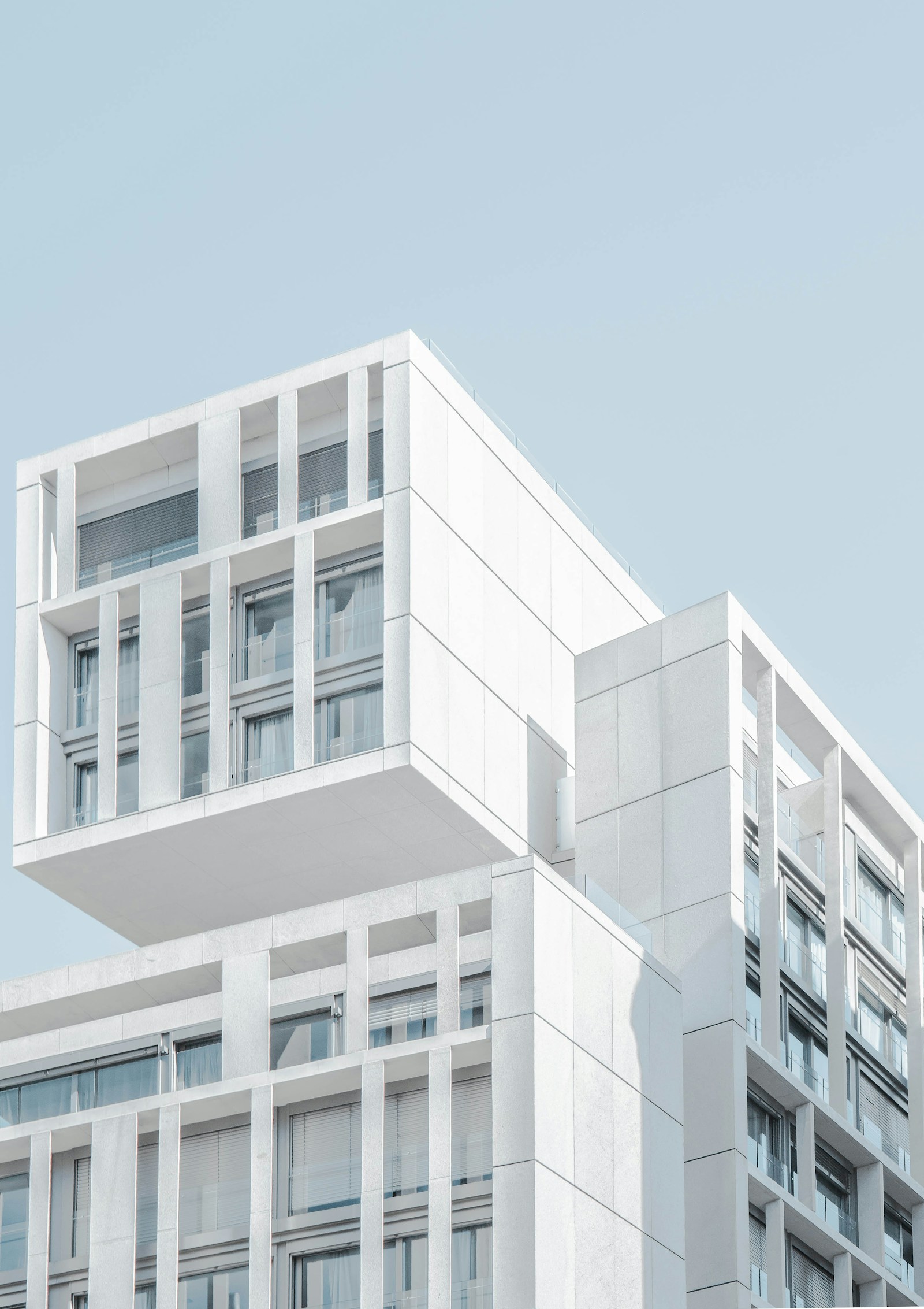 Temporary stock: modern white urban building with a gridded facade
